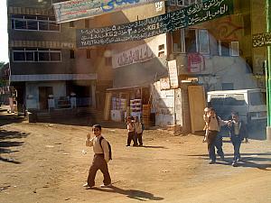 Children waving at our bus. This happened lots, and always made us smile.