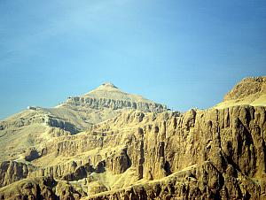 Atop the mountain, you can see a pyramid-shaped apex. Legend says this is why the Egyptians chose this mountain range for their tombs.