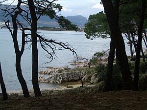 Looking across the inlet towards Croatian mainland. During the summer, these rocks serve as swimming entrances into the sea.