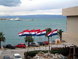 Croatia flags whipping in the wind.