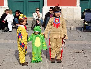 Children dressed up for Carnival, similar to Halloween in the US.