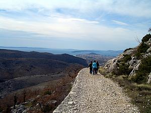 Walking along the stone wall at Mosor