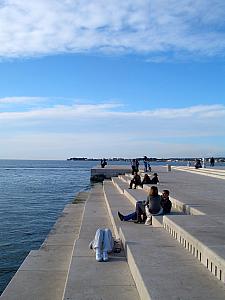 Arrived in Zadar - hanging out by the Sea Organ. That's Kelly laying down. The Sea Organ is this cool staircase that plays music, powered by waves underneath the steps. Youtube it!