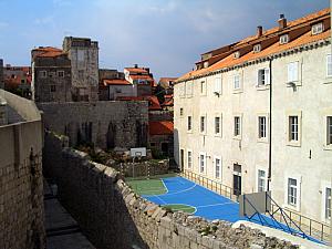 A Dubrovnik school's gymnasium - you can see the basketball hoops and the soccer goal, they also have lines drawn for volleyball.