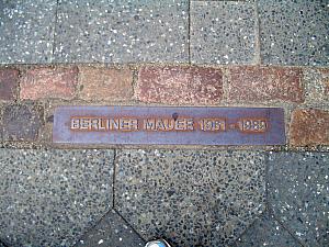 Close-up of the in-laid bricks indicating where the wall used to stand.