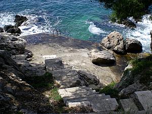 Walking along a path to a beach in Hvar.