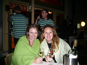 Paula and Kelly wrapped up in blankets during our dinner because we sat on the covered terrace as it was chilly and raining outside.