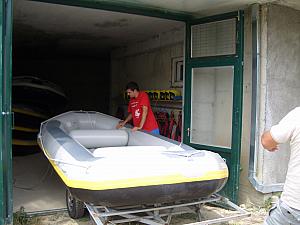 New rafting experience -- going to the garage to pick up our raft and pump it full of air, before heading to the river.