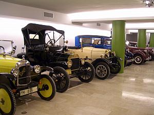 The hotel owner maintains an event space / personal classic car collection.