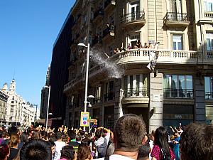 Apartment residents keeping parade-goers cool :)