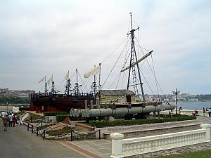 Some replica boats on display