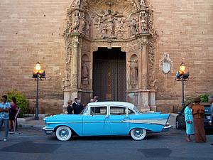 Classic car awaiting the bride and groom at the church.