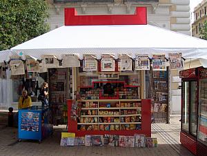 Kelly appreciated how the various newspapers were on display at this newsstand.