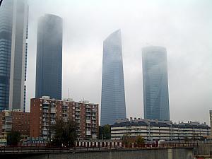 Foggy sky around skyscrapers just outside Madrid's Chamartin train station