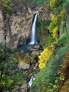 Ronda - Waterfall underneath the bridge.