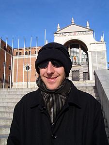 Jay in front of Museo de America, keeping warm.