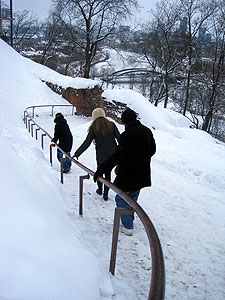 Carefully sliding back down the hill path.