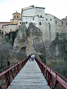 Crossing a high bridge into Cuenca's old town