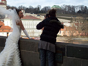 a bridal photo shoot on the city's famous Charle's Bridge.