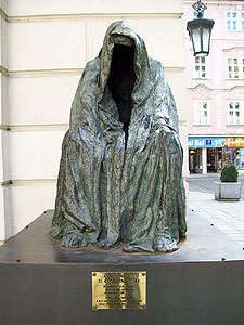 Chromy statue. The haunting hooded figure in Prague is labeled Il Commendatore, from Mozarts Don Giovanni.