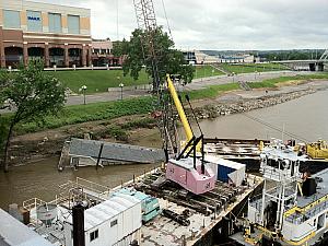 Ohio River flooding, May 2011, that's a building getting pulled out of the river.