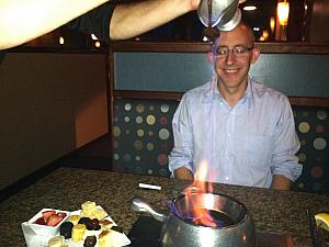 Preparing the chocolate sauce at The Melting Pot.