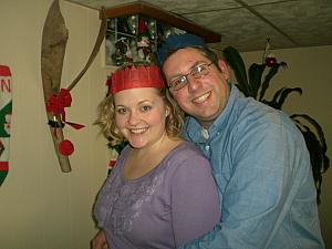 Chad and Jenny posing with their Christmas crowns