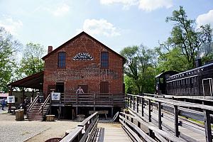 Metamora Water Mill as the train passes by.