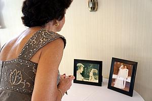 Mom Klocke checking out the parents' wedding photographs