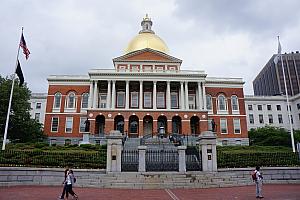 Driving by the Massachusetts State House, this time shown in daylight.