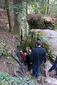 Descending a narrow staircase