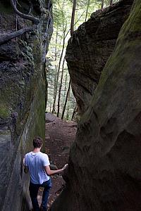 Descending a narrow staircase