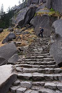 Continuing to hike up the staircase.