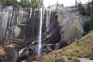 The Vernal Fall -- we're told that in the springtime as the snow melts from the mountains, this fall covers the span of the dark-colored rock.