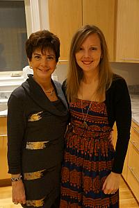 Kelly and her mom smiling for a photo