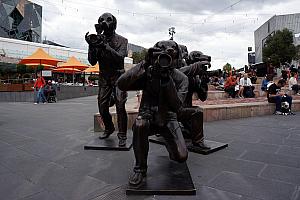 March 23: We started our trip in Melbourne for a few days before heading to Sydney and getting on our cruise ship. Here we are in Melbourne's Fed Square, checking out a statue of paparazzi dogs.