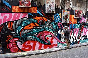 The most famous street for graffiti is this one - Hosier Lane. Here's an artist in action.