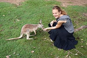 Kelly feeding a Kangaroo kid.