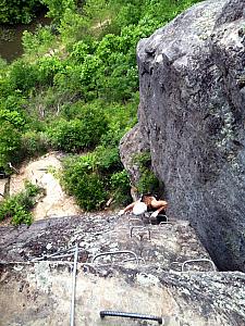 First, we have to climb up the 130 foot "ladder", using the rebar rods drilled into the wall. These rods were actually throughout some/most of our climbing course. We would get cranky when they weren't on the course, forcing us to use the rock shelf and niches as handholds :)