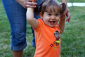 Claire playing in the back yard