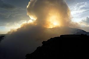 Smoke rising from the crater.