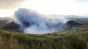 More smoke rising from the crater.