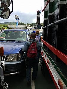 Squeezing through the trucks and cars as we exit the ferry.