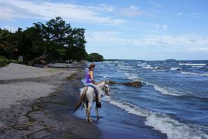 Riding along the beach -- it was fun to canter along the beach.