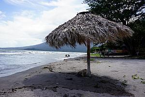 Fun thatch-roof umbrellas along the beach.