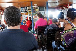 As I hinted at before, we were not amused at the ferry's seating arrangements. The tiny cabin was completely full, and all of the seating was these unforgiving park benches. So, our 75 minute quite rocky ride back to the mainland was not the most comfortable, but we managed :).