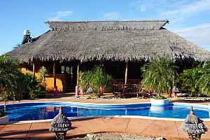 Bueno Onda's poolside area and main reception / dining area.