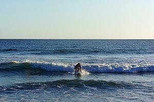 Now, it's Kelly's turn. The waves this afternoon weren't as big as when we took our lesson -- we think we missed the proper tide/time.