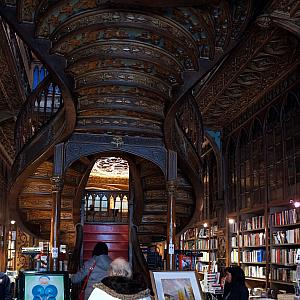 The Livraria Lello & Irmao bookstore -- a famous bookstore in central Porto. Google "Porto bookstore" for better photographs -- they discouraged tourist photography. I was scolded for sneaking this shot :)