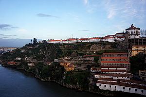 View of Vila Nova de Gaia, while crossing the Douro River on a bridge 